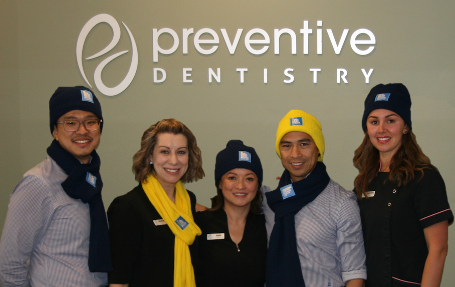 Preventive Dentistry team wearing beanies and scarves, ready for the CEO Sleepout